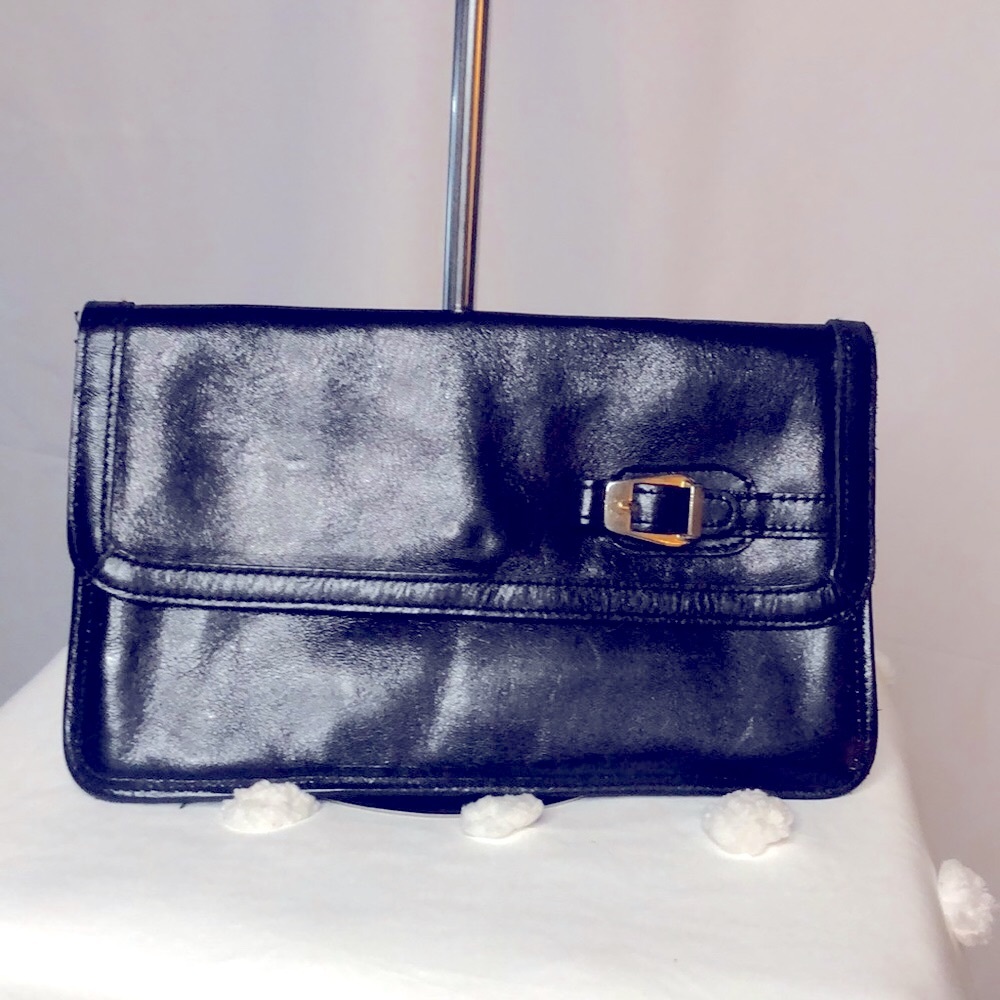 CONTESSA black leather clutch.
